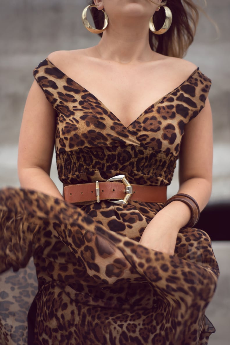 Wild woman in animal print outfit details