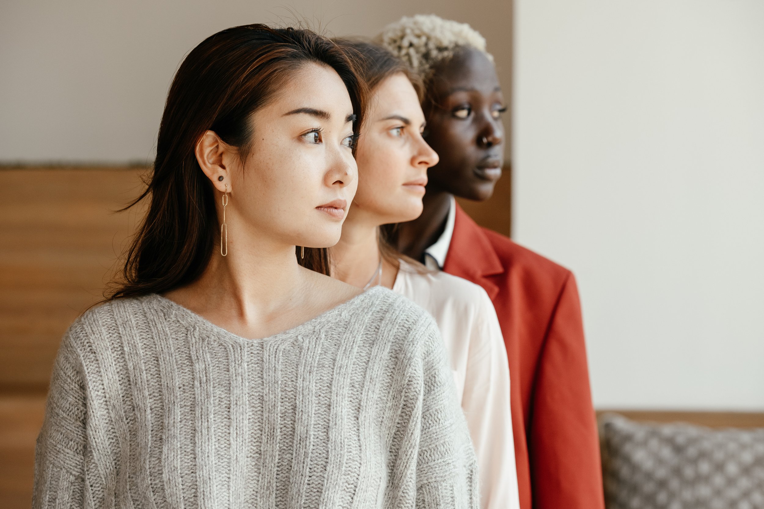 Multiethnic women in casual outfits together